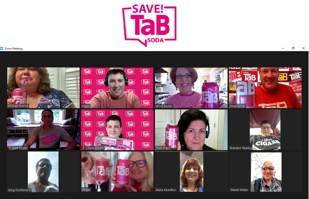 The SaveTaBSoda Committee together on a Zoom meeting, raising their TaB cans