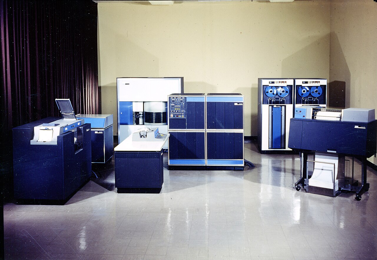 An IBM 1401 mainframe computer installation, circa 1963 — the machine used to generate TaB's name